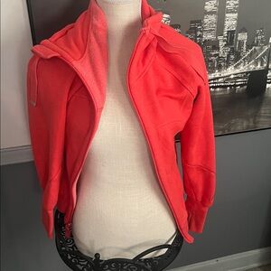 Orange jacket with thumb wholes soft